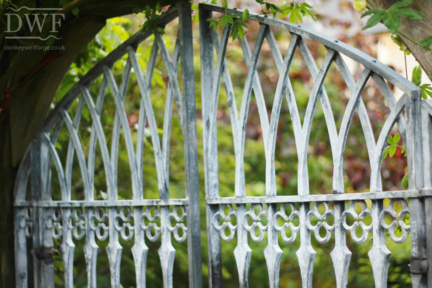 gothic-garden-railings-gates-traditional-ironwork-detail-rivited-lattice-bars-quatrefoils